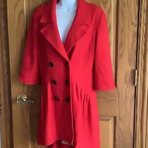 Free People coat. Red . 3/4 length sleeves, 2 pockets. 40% wool. Small?